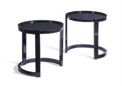 A PAIR OF BLACK LACQUER HORSESHOE SHAPED TABLES, BY ANOUSKA HEMPEL