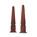 A PAIR OF MAHOGANY AND EBONISED OBELISKS BY ANOUSKA HEMPEL