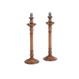 A PAIR OF TURNED AND STAINED WOOD COLUMNAR TABLE LAMP BASES, 20TH CENTURY