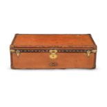 LOUIS VUITTON, A BROWN LEATHER HARD SUITCASE