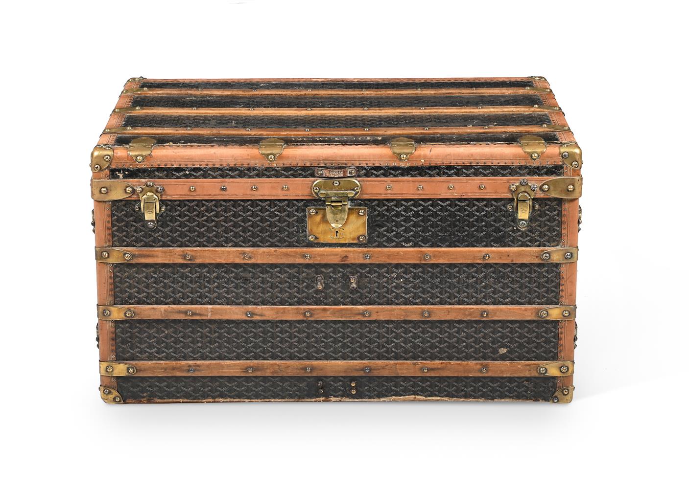 A JACQUARD CHEVRON COATED CANVAS TRAVELLING TRUNK