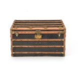 A JACQUARD CHEVRON COATED CANVAS TRAVELLING TRUNK