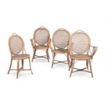 A SET OF THREE WICKER AND CANED ARMCHAIRS AND A MATCHING SIDE CHAIR 20TH CENTURY