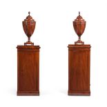 A PAIR OF MAHOGANY PEDESTAL CABINETS AND A PAIR OF URN SHAPED KNIFE BOXES19TH CENTURY AND LATERthe