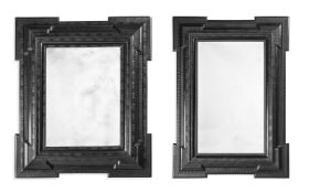 TWO SIMILAR EBONISED WALL MIRRORS IN FLEMISH 17TH CENTURY STYLE