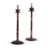 TWO INDIAN RED AND BLACK DECORATED TURNED WOOD TABLE LAMPS, FIRST HALF 20TH CENTURY