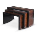 A SET OF THREE GRADUATED BLACK LACQUER AND FAUX LEATHER CONSOLE TABLES, BY ANOUSKA HEMPEL