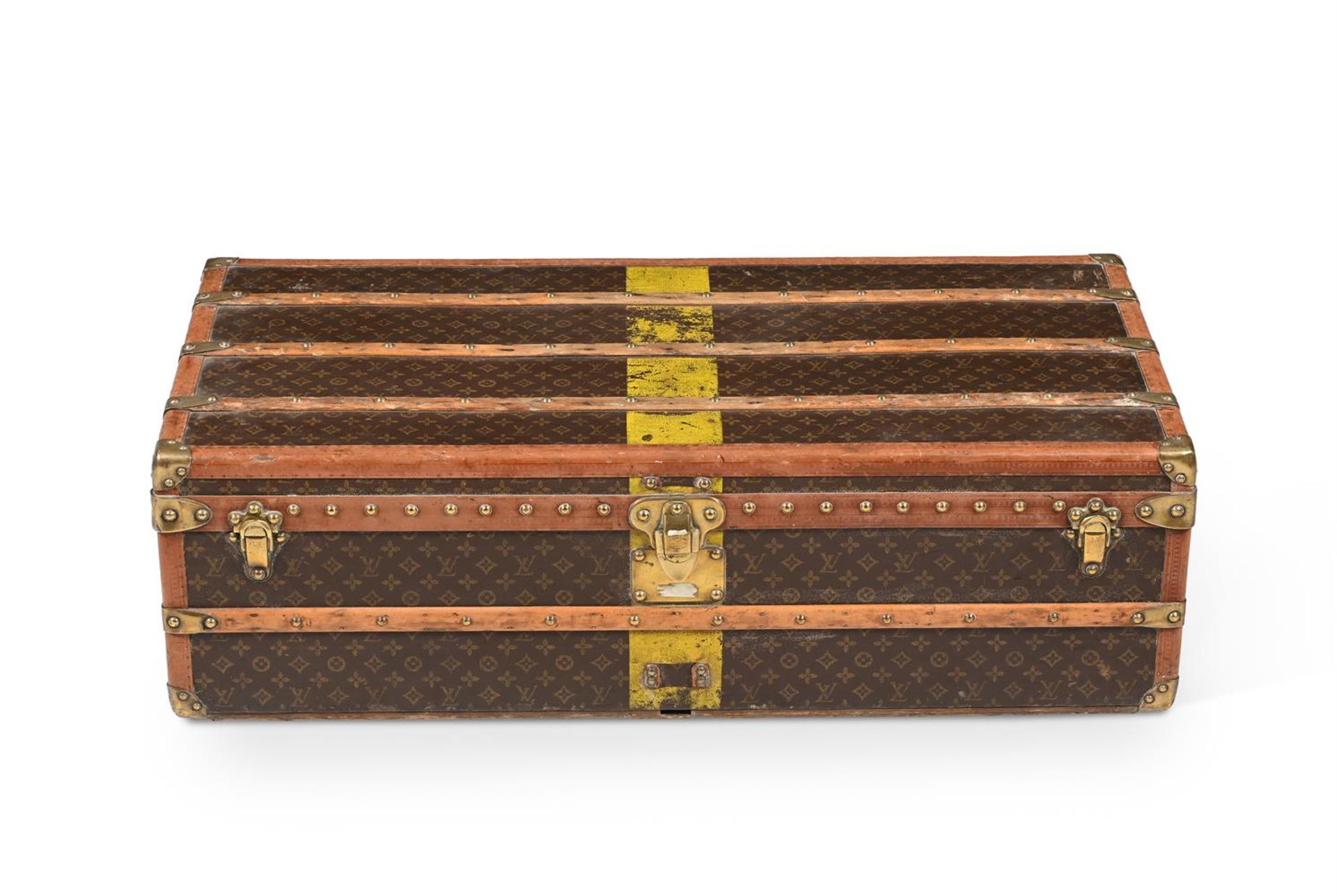 LOUIS VUITTON, A MONOGRAMMED COATED CANVAS HARD TRAVELLING TRUNK