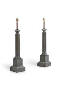 A PAIR OF FRENCH BRONZED COLUMN FORM LAMPS