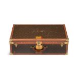 LOUIS VUITTON, A MONOGRAMMED COATED CANVAS HARD SUITCASE