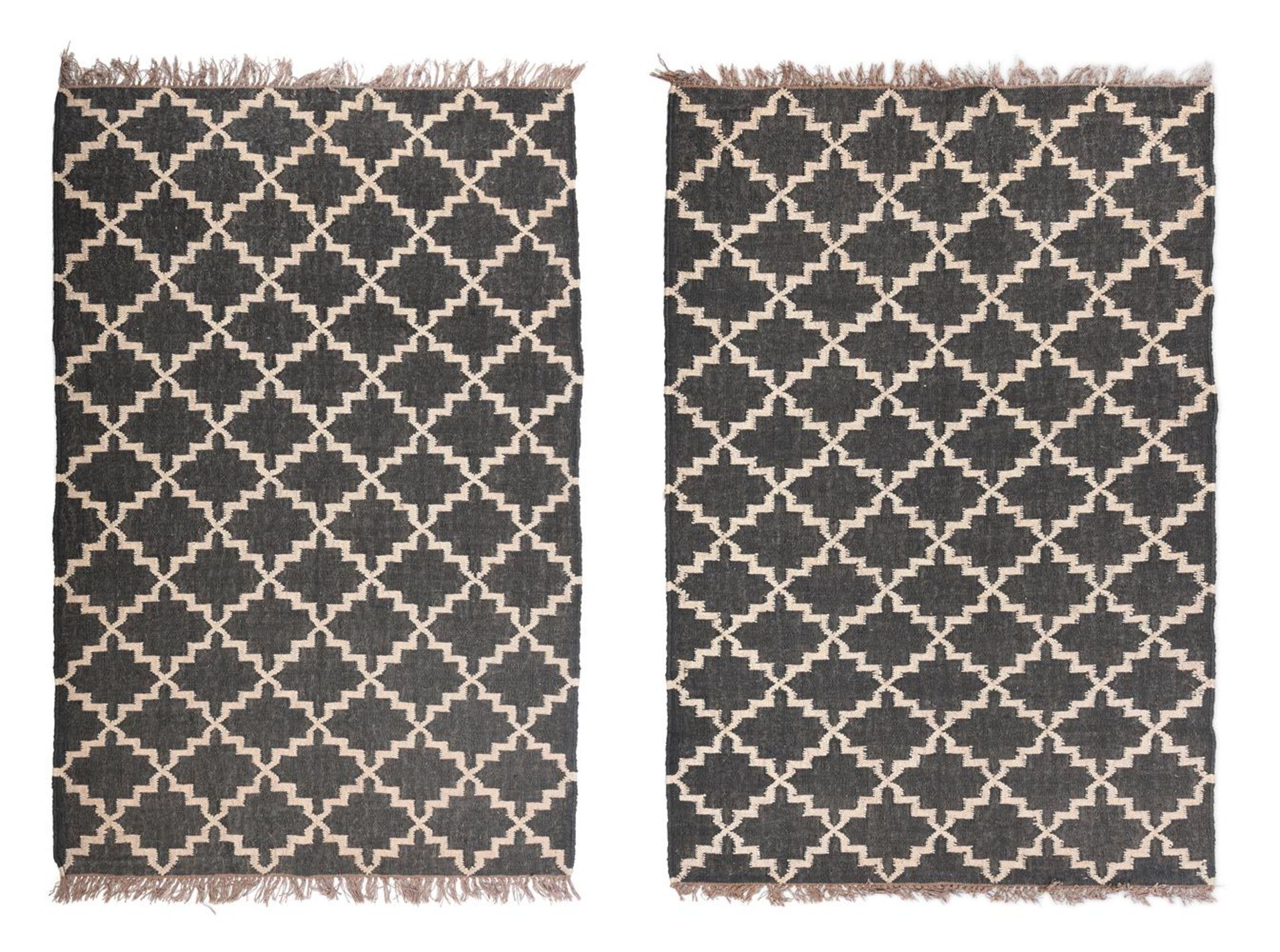 A PAIR OF BROWN GEOMETRIC PATTERNED FLATWEAVE RUGS, BY ANOUSKA HEMPEL