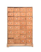 A PINE MULTI-DRAWER CHEST 19TH CENTURY ELEMENTS AND LATER