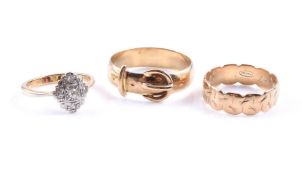 A DIAMOND PANEL RING AND TWO FURTHER RINGS