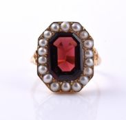 A GARNET AND CULTURED PEARL CLUSTER DRESS RING
