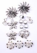 NIELS ERIK FROM, A COLLECTION OF VINTAGE SILVER COLOURED FLOWER HEAD JEWELLERY