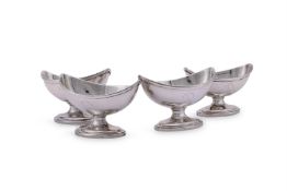 A SET OF FOUR GEORGE III SILVER NAVETTE SALTS