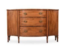 A GEORGE III MAHOGANY SERPENTINE FRONTED COMMODE, CIRCA 1790