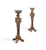 A PAIR OF CARVED PINE AND PARCEL GILT TORCHERES, IN 18TH CENTURY STYLE, 19TH CENTURY
