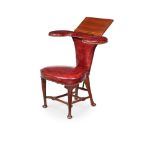 Y A MAHOGANY AND LEATHER UPHOLSTERED READING CHAIR, IN GEORGE II STYLE