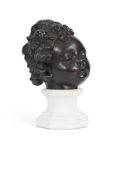 A BAROQUE BRONZE HEAD OF A CHILD ITALIAN, PROBABLY 17TH OR 18TH CENTURY