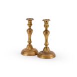 A PAIR OF FRENCH ORMOLU CANDLESTICKS, LATE 18TH OR EARLY 19TH CENTURY STYLE