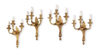 A SET OF FOUR LARGE ORMOLU THREE LIGHT WALL APPLIQUES, FRENCH, MID TO EARLY 19TH CENTURY