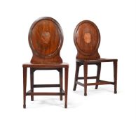Y A PAIR OF GEORGE III MAHOGANY AND SATINWOOD INLAID HALL CHAIRS, CIRCA 1780