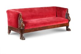 A FRENCH MAHOGANY AND UPHOLSTERED SOFA, IN EMPIRE STYLE, CIRCA 1810-1840