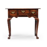 A GEORGE II 'RED WALNUT' SIDE TABLE, CIRCA 1750