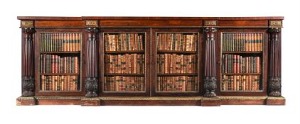 Y A GEORGE IV ROSEWOOD, SIMULATED ROSEWOOD AND GILT METAL MOUNTED BOOKCASE, CIRCA 1825