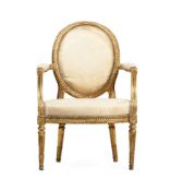 A GEORGE III CARVED GILTWOOD OPEN ARMCHAIR, IN THE MANNER OF JOHN LINNELL, CIRCA 1780