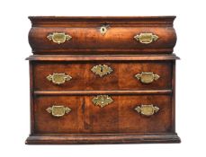 A QUEEN ANNE WALNUT CHEST OF DRAWERS, CIRCA 1710