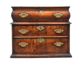 A QUEEN ANNE WALNUT CHEST OF DRAWERS, CIRCA 1710