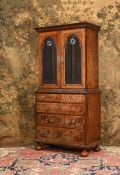 A FINE WILLIAM AND MARY BURR WALNUT, WALNUT AND FEATHER-BANDED CABINET, CIRCA 1690