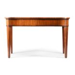 A GEORGE III MAHOGANY AND SATINWOOD INLAID SERPENTINE SIDE TABLE, IN THE MANNER OF INCE & MAYHEW