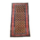 A KARABAGH LONG RUG, approximately 270 x 123cm