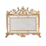 A GILTWOOD AND COMPOSITION MIRROR, IN NEOCLASSICAL TASTE, 19TH CENTURY