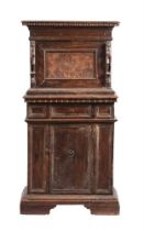 AN ITALIAN CARVED WALNUT SECRETAIRE CABINET MID 17TH CENTURY