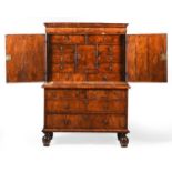 A QUEEN ANNE WALNUT CABINET ON CHEST, CIRCA 1710