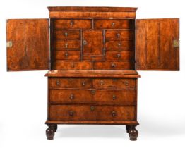 A QUEEN ANNE WALNUT CABINET ON CHEST, CIRCA 1710