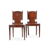 A PAIR OF GEORGE III MAHOGANY AND GILT METAL MOUNTED HALL CHAIRS, ATTRIBUTED TO GILLOWS