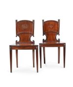 A PAIR OF GEORGE III MAHOGANY AND GILT METAL MOUNTED HALL CHAIRS, ATTRIBUTED TO GILLOWS