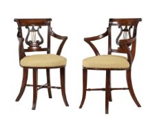 A PAIR OF CARVED MAHOGANY ARMCHAIRS, OF MUSIC ROOM DESIGN, FIRST HALF 19TH CENTURY