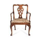 A GEORGE II WALNUT OPEN ARMCHAIR, CIRCA 1750