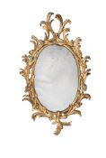 A CARVED GILTWOOD MIRROR, IN GEORGE III STYLE, IN THE MANNER OF JOHN LINNELL, MID 19TH CENTURY
