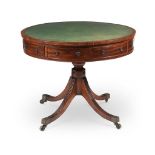 A GEORGE III MAHOGANY 'DRUM' LIBRARY TABLE, CIRCA 1800