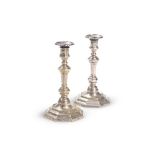 A PAIR OF SILVERED BRASS CANDLESTICKS, FIRST HALF 18TH CENTURY