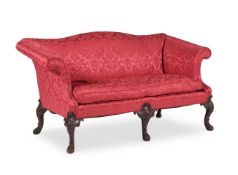A MAHOGANY AND UPHOLSTERED SETTEE, IN GEORGE II STYLE, 20TH CENTURY