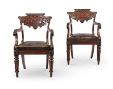 A PAIR OF GEORGE IV MAHOGANY LIBRARY ARMCHAIRS, IN THE MANNER OF BANTING, FRANCE & CO