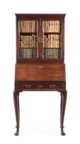 A GEORGE II MAHOGANY BUREAU CABINET, CIRCA 1740